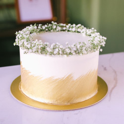 Gold Swash Cake with Baby's Breath