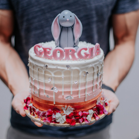 Rose Gold Ombre Striped Cake with Edible Flowers & Fondant Rabbit Topper
