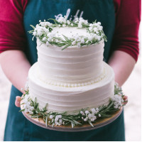 Two Tier White Striped Cake with Rosemary and Baby's Breath